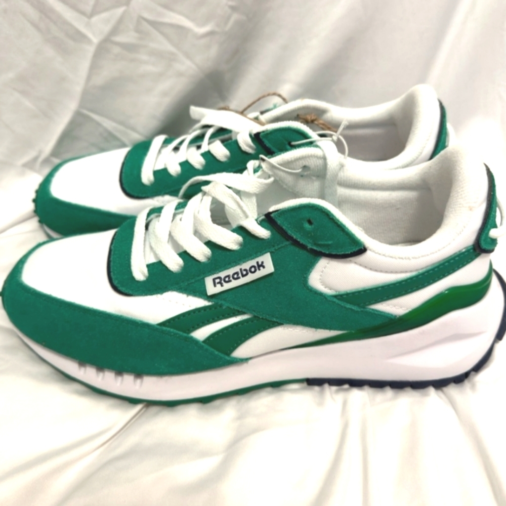 White and green Reebok sneaker